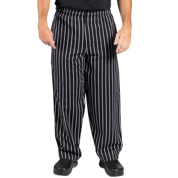 a person wearing black and white striped pants