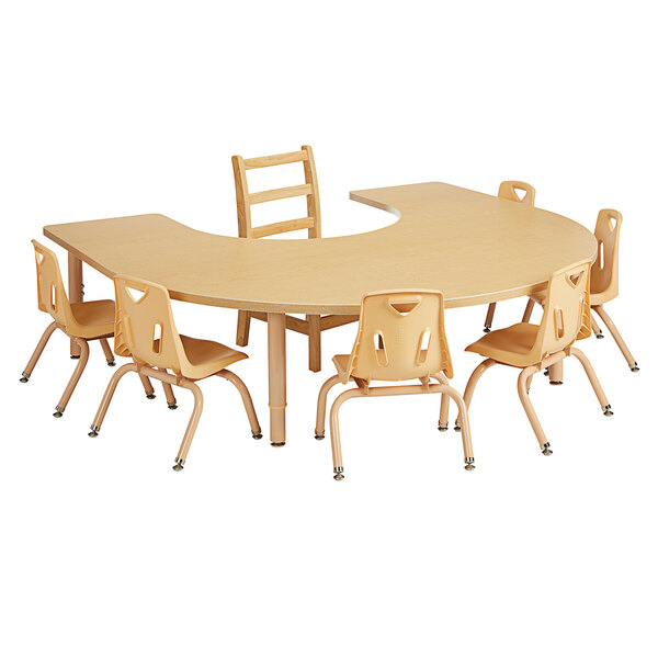 A Jonti-Craft wooden horseshoe table with adjustable legs and chairs around it.