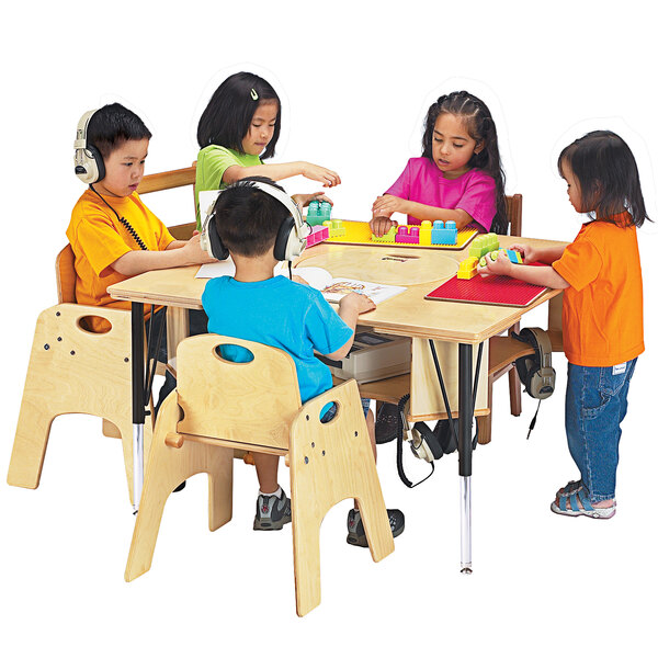 A group of children sitting at a Jonti-Craft adjustable height table playing with toys.