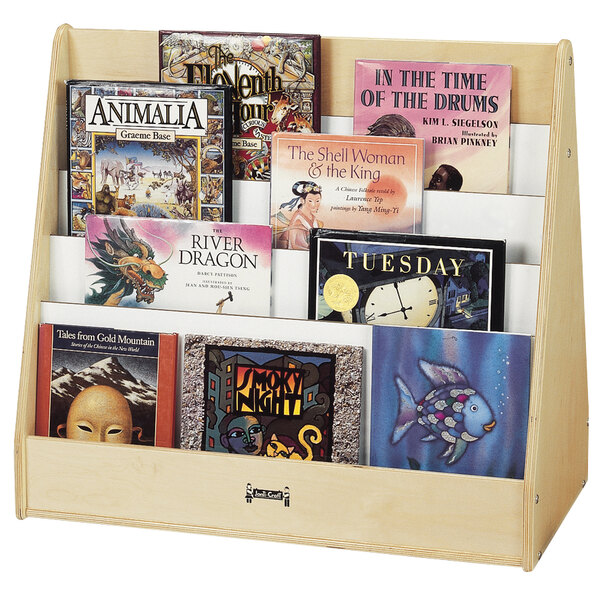 A Jonti-Craft wooden double-sided book stand with books on it.