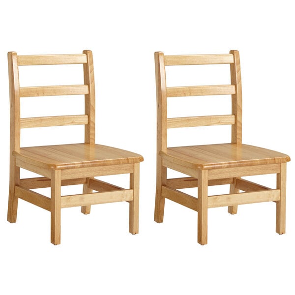 a pair of wooden chairs