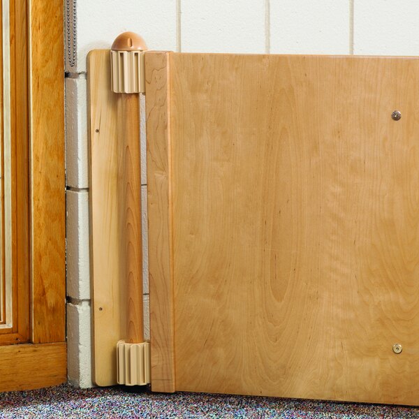 A wooden door frame with a wooden post.