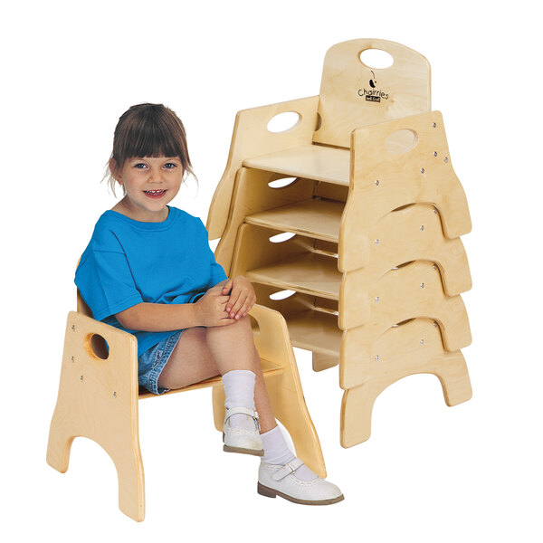 A young girl sitting in a Jonti-Craft Baltic Birch wood toddler chair.