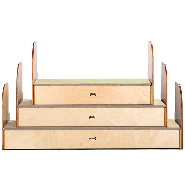 A wooden stair with wooden top and shelves with drawers.