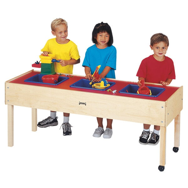 a group of children playing with toys