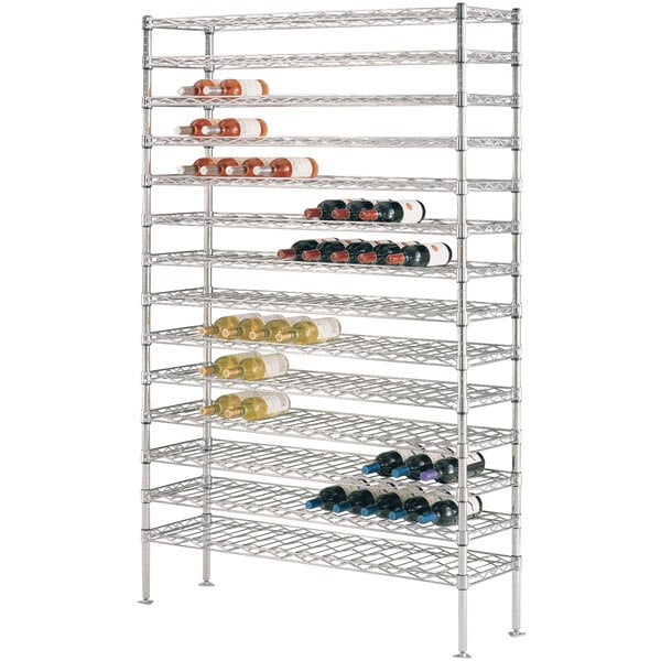 A silver metal Super Erecta cradle wine rack with wine bottles on it.