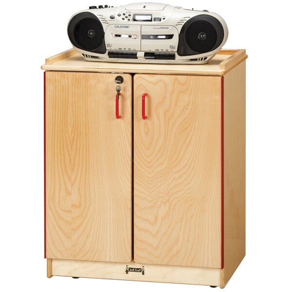 A Jonti-Craft wooden media cart with a white radio on top.