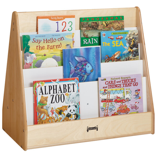 A Jonti-Craft wooden book stand with books on it.