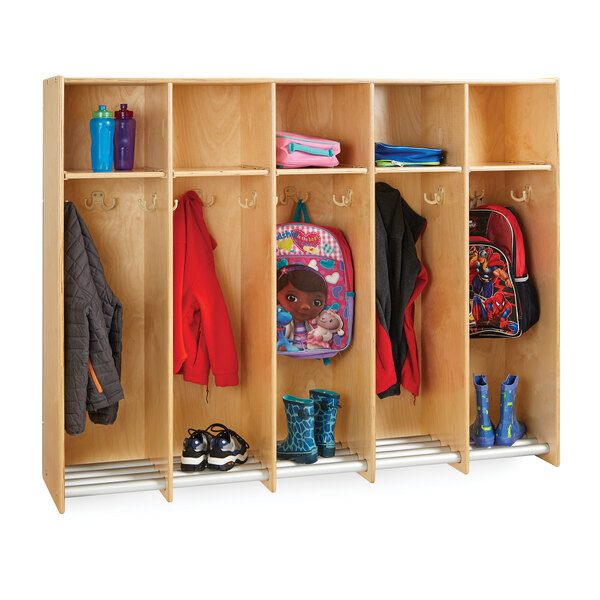 A Jonti-Craft wooden locker with different clothes and backpacks inside.