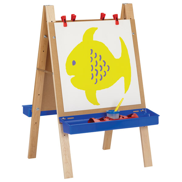 A Jonti-Craft adjustable wooden easel with a yellow fish drawing on a white board.