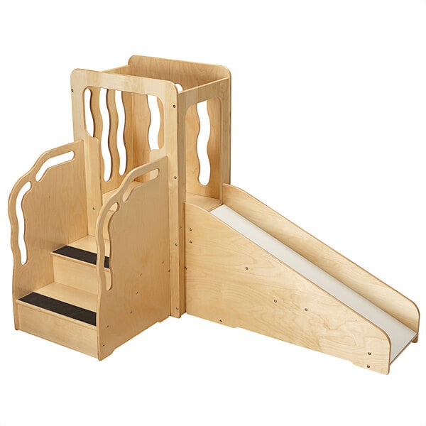 A wooden play loft with a slide and steps.