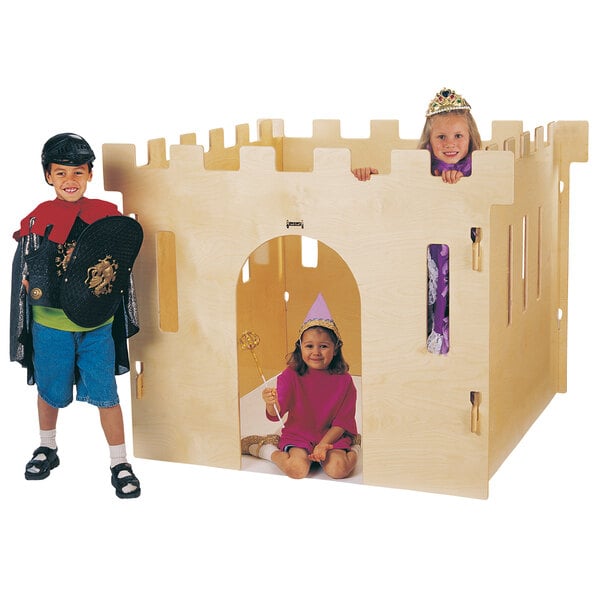 A group of kids playing in a Jonti-Craft KYDZ Queen Castle.