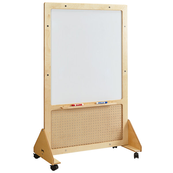 A whiteboard with a wooden frame on wheels.