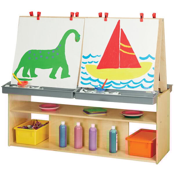 A natural wood 4-station art center with a drawing board and two drawers.