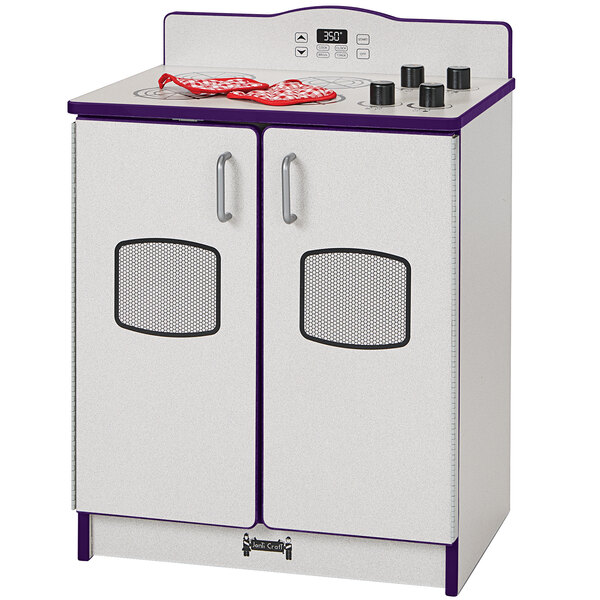 A white and purple toy stove with two drawers.