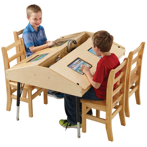 a group of kids playing with a table