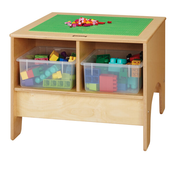 A Jonti-Craft wooden table with 4 plastic bins on a green base.