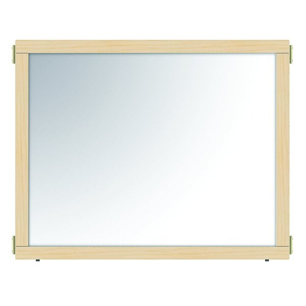 A whiteboard with a wooden frame.