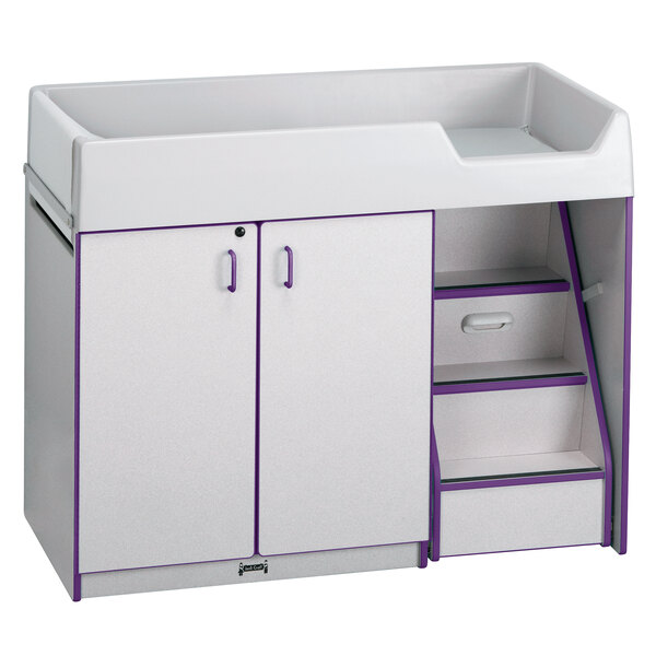 A white rectangular diaper changing station with purple edges.