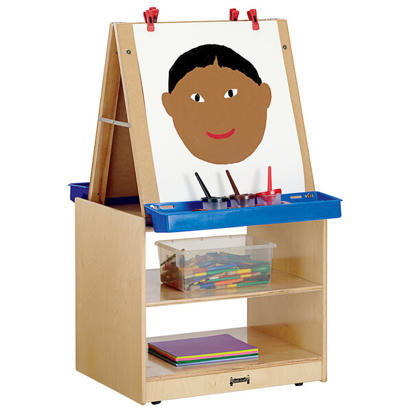 A Jonti-Craft 2-station art center with a child's wooden easel.