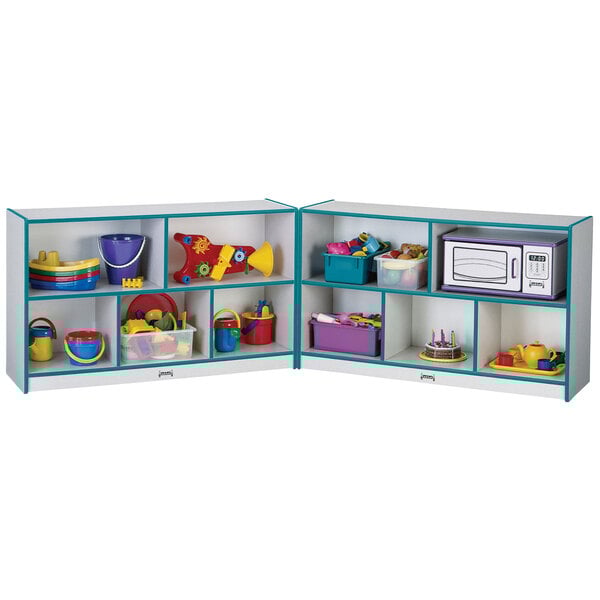 A Rainbow Accents teal laminate storage cabinet filled with toys on shelves.