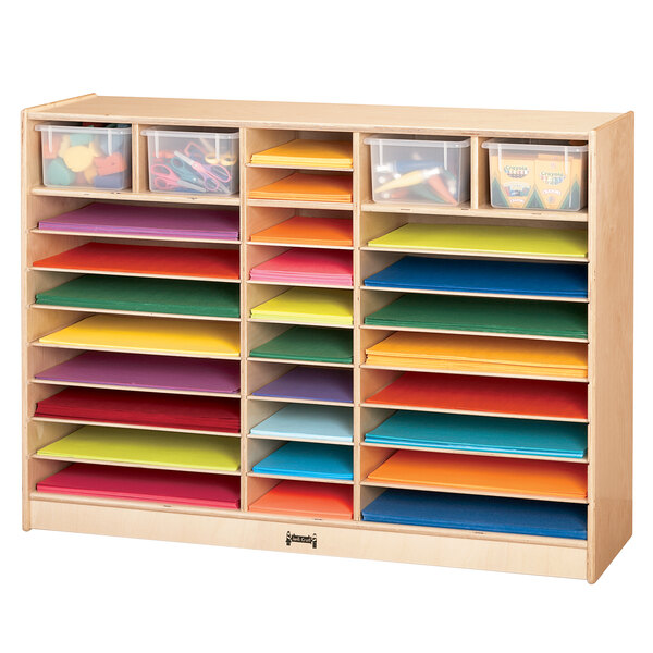 A Jonti-Craft wooden mobile paper center with colorful paper and plastic bins on the shelves.