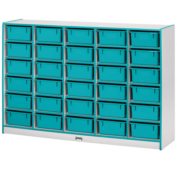 A white and teal storage cabinet with blue bins on the shelves.