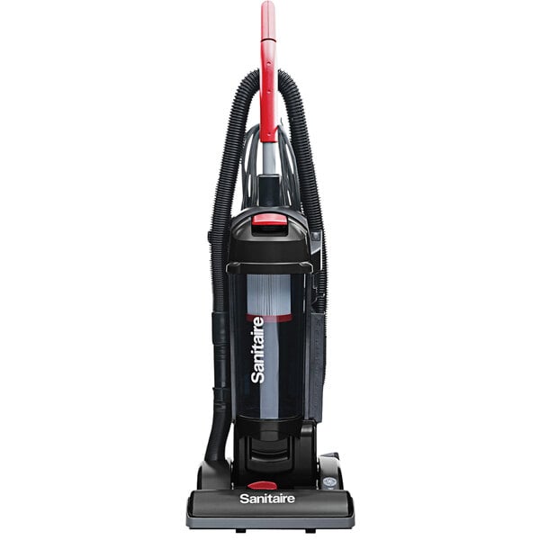 A Sanitaire bagless upright vacuum cleaner with a red handle.