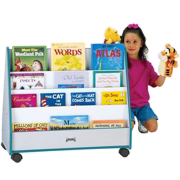 A little girl using a Rainbow Accents teal and gray mobile double-sided book stand to read a book with a stuffed tiger.