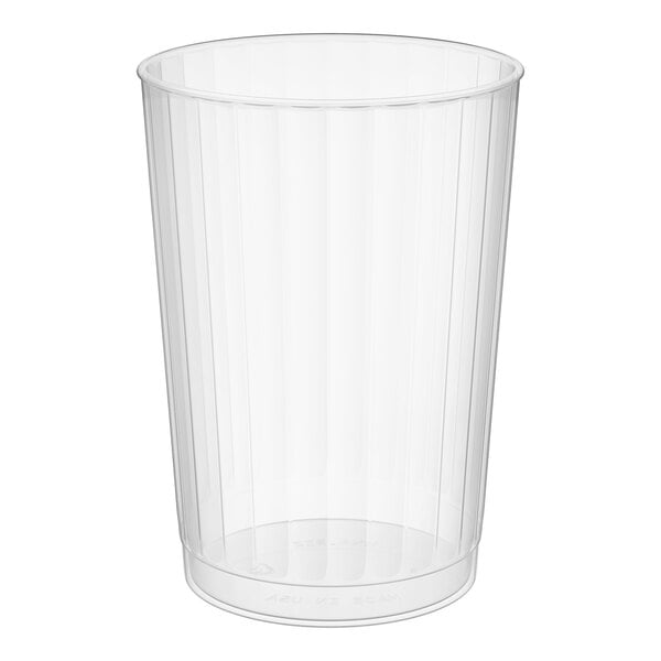 A clear plastic fluted tumbler with a 14 oz. capacity.