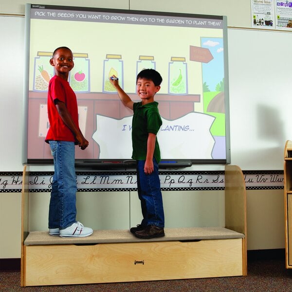 Two children using a SMART Board