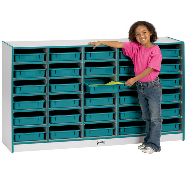 a boy in a pink shirt