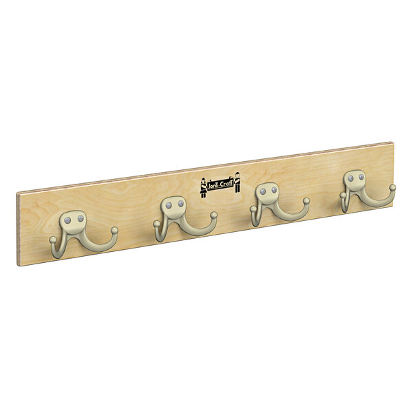 A Jonti-Craft wooden wall mount coat rack with four hooks.