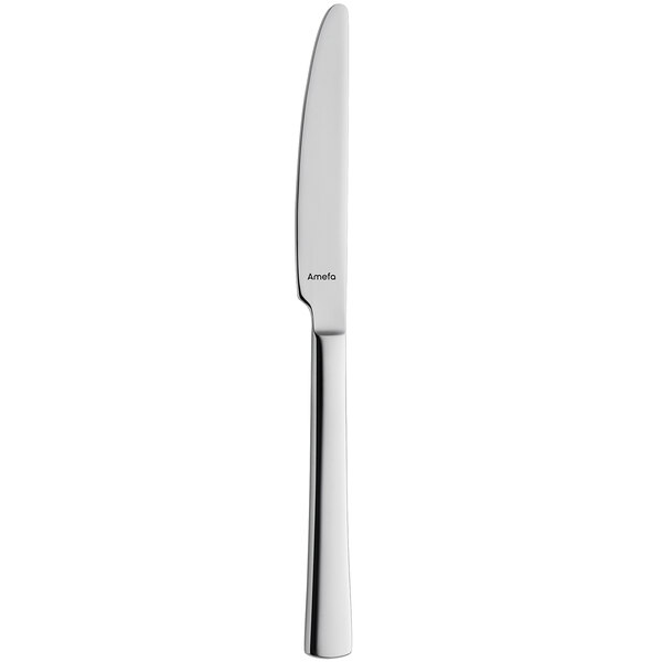 An Amefa stainless steel table knife with a silver handle.