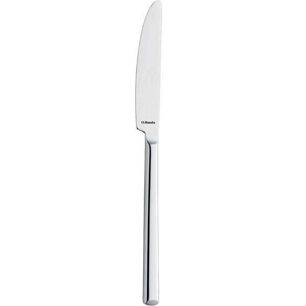 An Amefa Metropole stainless steel table knife with a long silver handle.