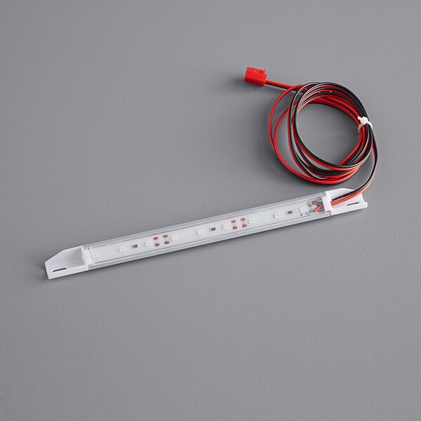 An Avantco blue LED light strip with white connector and red and black wires.