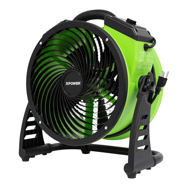 An XPOWER green and black DC powered air circulator fan.