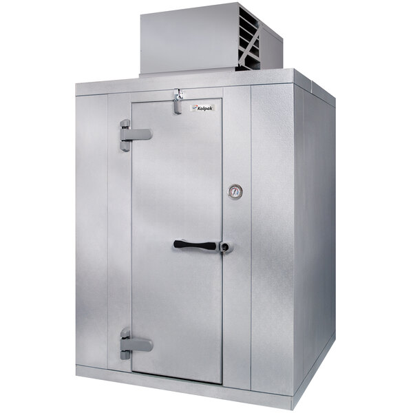 A Kolpak indoor walk-in cooler with the door open.