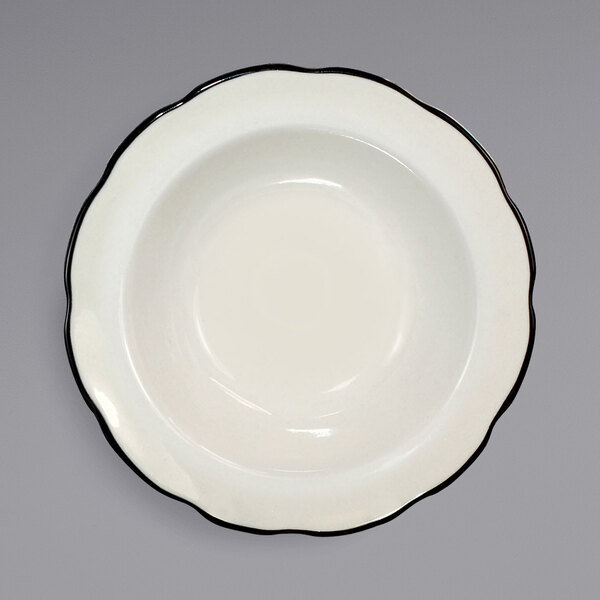 An International Tableware Sydney stoneware bowl with a black rim.