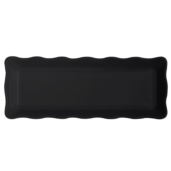 a black rectangular tray with wavy edges