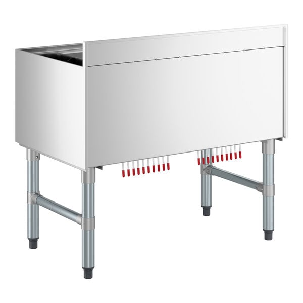 A stainless steel underbar ice bin with a 10 circuit post-mix cold plate and bottle holders.