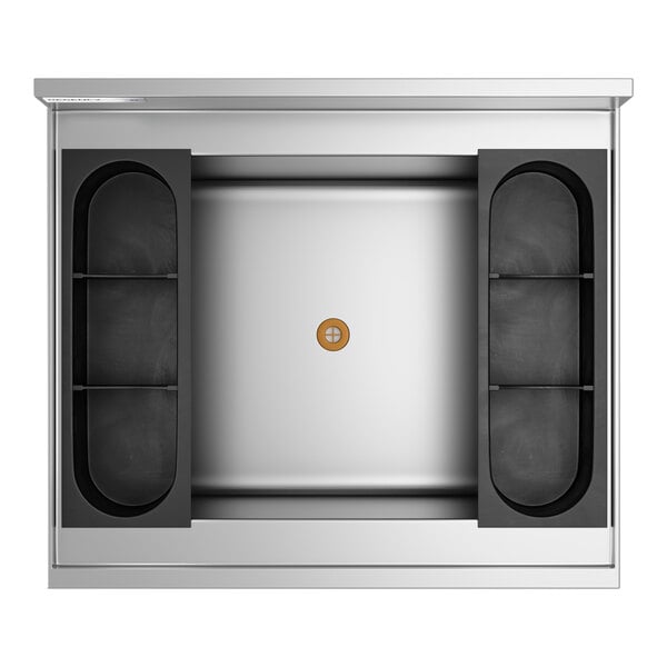 A stainless steel underbar ice bin with a cold plate and black bottle holders.