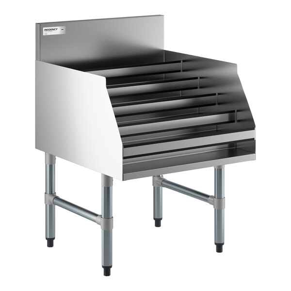 A stainless steel five-tiered display rack with a backsplash and four sturdy legs.