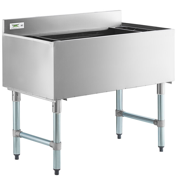 A Regency stainless steel underbar ice bin with a cold plate and bottle holders.