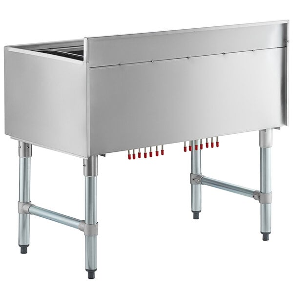 A Regency stainless steel underbar ice bin with cold plate and bottle holders.