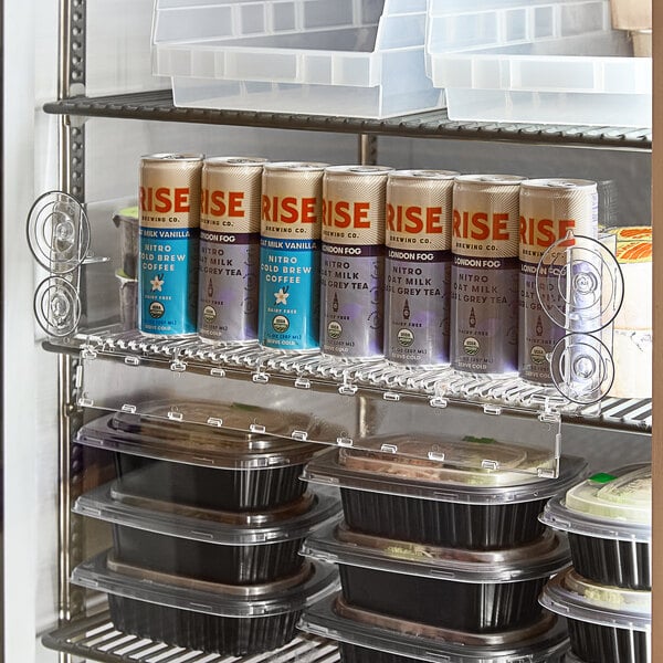 A 3" Large Cooler Door Merchandiser in an organic food store filled with food and drink containers.