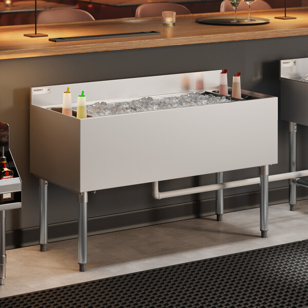 Regency IB214812 21" x 48" Stainless Steel Underbar Ice Bin with Bottle Holders - 161 lb.