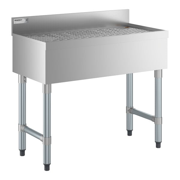 A stainless steel underbar drainboard with a raised backsplash and sturdy legs, measuring 36 inches by 18 inches.