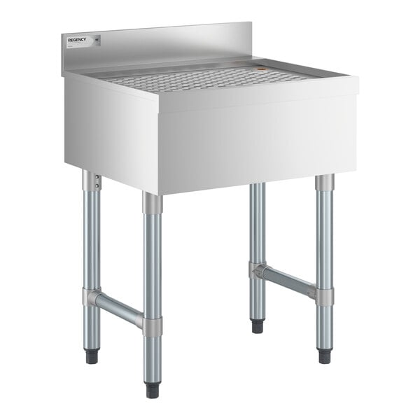 A stainless steel underbar drainboard with four legs and a raised backsplash, measuring 24 inches by 21 inches.