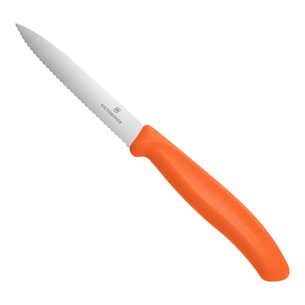 A Victorinox Swiss Classic 4-inch serrated spear point paring knife with a tangerine orange handle.